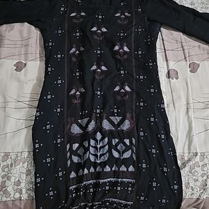 Its Black Top With Red And White Patterns