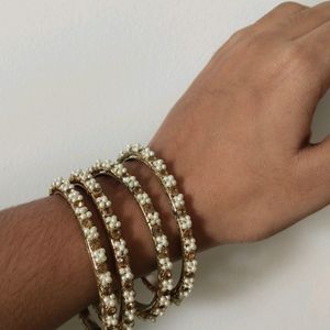 4 Set Gold Plated Bangles With White Pearls