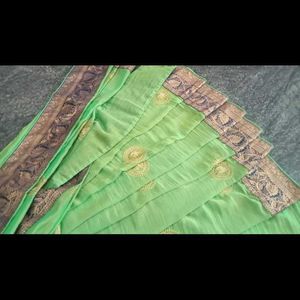 Eligent Green Saree With Peacock Pattern