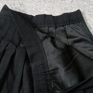 Black Long Pleated Skirt With Leather Straps