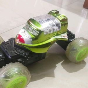 Movable Green And Black Toy Car