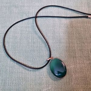 Green Oval Shaped Stone Pendant