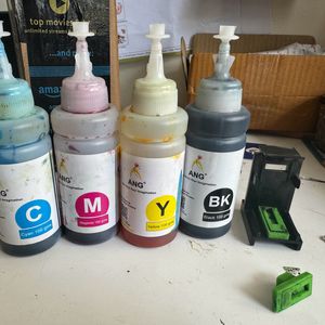 AGN ink bottles with suction machine