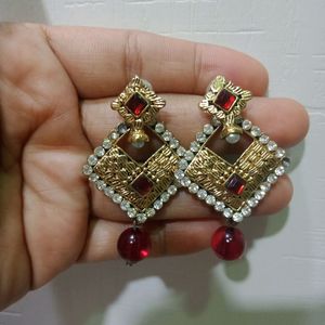 red traditional earings