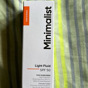 MINIMALIST LIGHT FLUID SPF 50 FACE SUNSCREEN