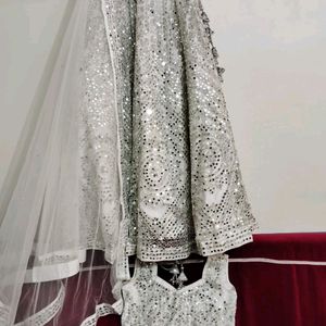 White Colour Heavy Mirror Worked Lehenga