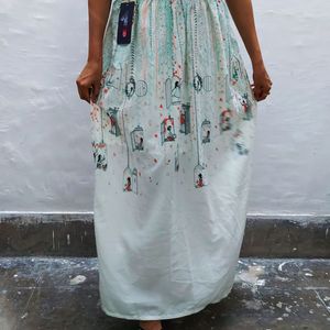 CHUMBAK off-white and green printed maxi skirt