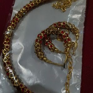 Red- Golden Neck Piece And Earrings