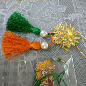 Saffron White Green Coloured Rakhi for Bhai Bhabhi