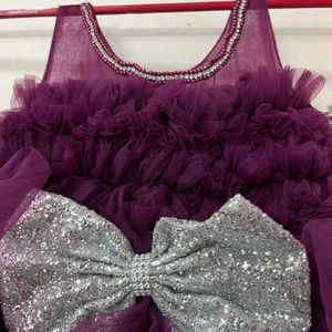 Sleeveless Frock With Silver Shimmery Bow
