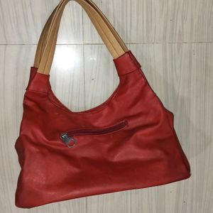 Beautiful Red Coloured Hand Bag In Good Condition