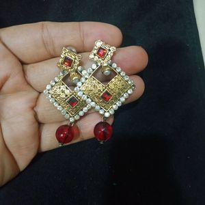 red traditional earings