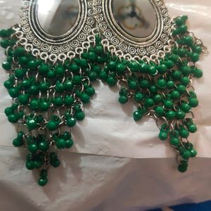 Earrings Green In Color