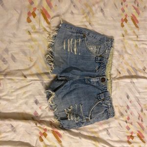 Ripped denim shorts