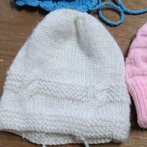 4 Winter Caps Nd 3 Pair Of Booties