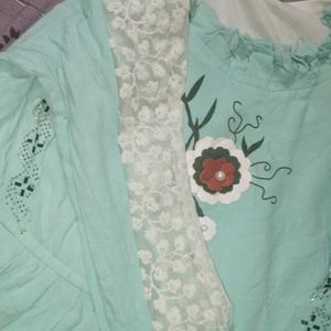 Top sea green colour with white sleeve round neck