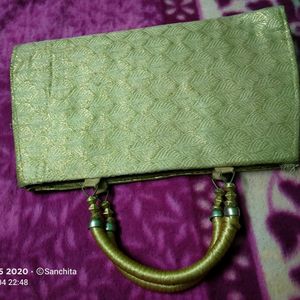 Golden Clutch With Zari Work