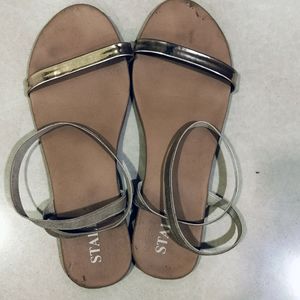 2 Pair Of Golden Flats Sandal