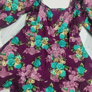 very pretty floral dress for casual or party wear.