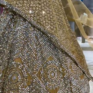 Golden Heavy Mirror Worked Lehenga