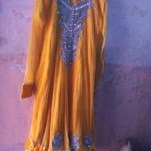 Beautiful Real Diamond Yellow Net Gown, Damage In