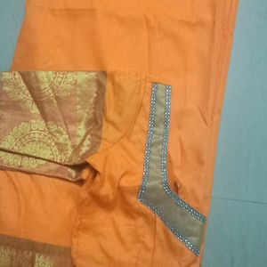 Yellow Saree And Stiched Blouse