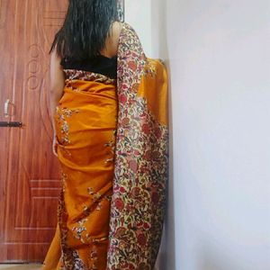 Beautiful Golden coloured floral silk Saree with lace