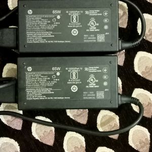 2 HP LAPTOP CHARGER 65 +65 WATT NEW AND ORIGINAL