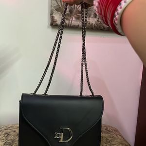 NEW BLACK SLING BAG ( Not used)