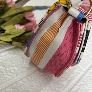 Multicoloured hexagonal sling bag