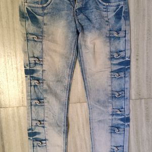 Designer jeans with multiple buttons