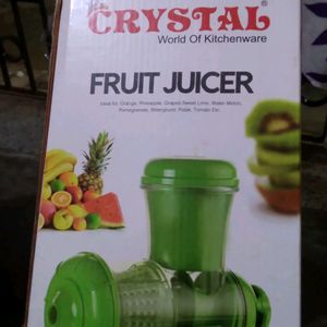 Manual Fruit Juicer With A Glass Tubler