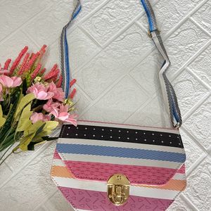 Multicoloured hexagonal sling bag