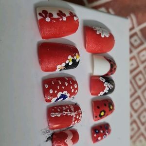 Red Colour False Nail In Good Condition .