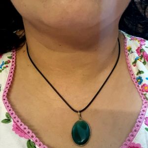 Green Oval Shaped Stone Pendant