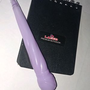 Cute Purple Pen And A Small Notepad..