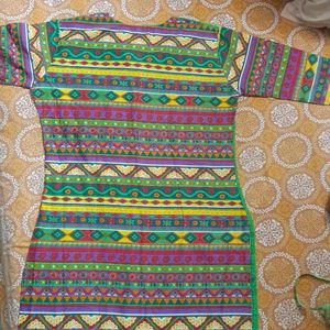 Beautiful Rayon kurti...front is green and back is multicoloured...totally new ...no flaws....not used single time...three quarters sleeves...side cut