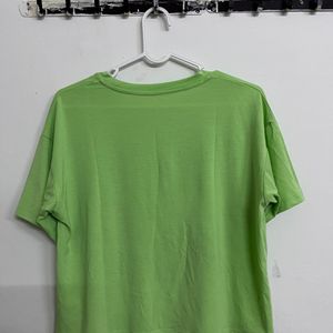 .green crop top