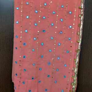 A Beautiful Saree With Preety Work On It