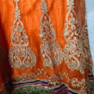 Orange And Golden Embroidered Lehenga