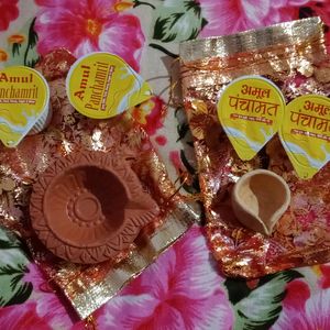 2 Pieces Diya + 4 Packs Amul Panchamrit