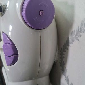 Mini Sewing Machine.