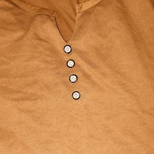 A T-shirt In Brown Colour