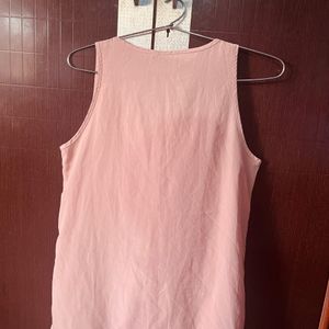 A Peach Colour Top.  Size:M.