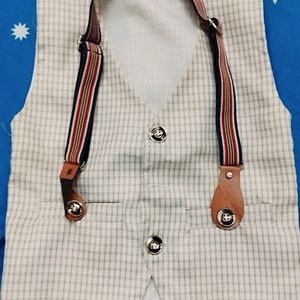 A Chek Jacket With Striped Suspenders