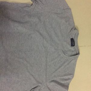 grey branded tshirt