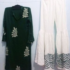 Beautiful Green Kurta With White Shrara.