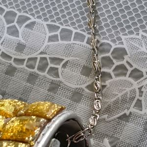 Silver Clutch with golden stones