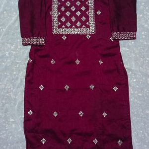 A Traditional Meroon Color Kurta (Womens Wear)