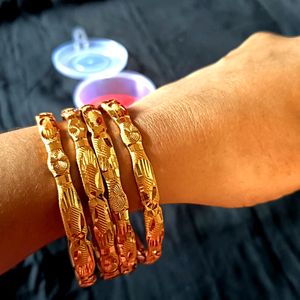 4 Pieces Golden Bangles.2.2 Size.